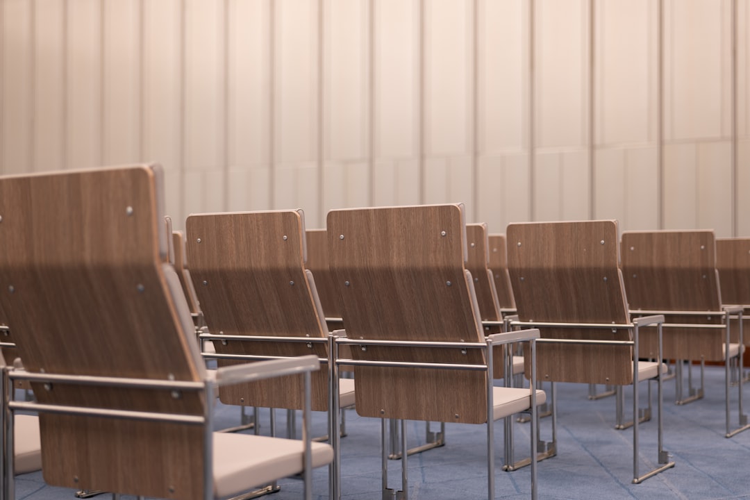start therapy program — a row of wooden chairs sitting next to each other